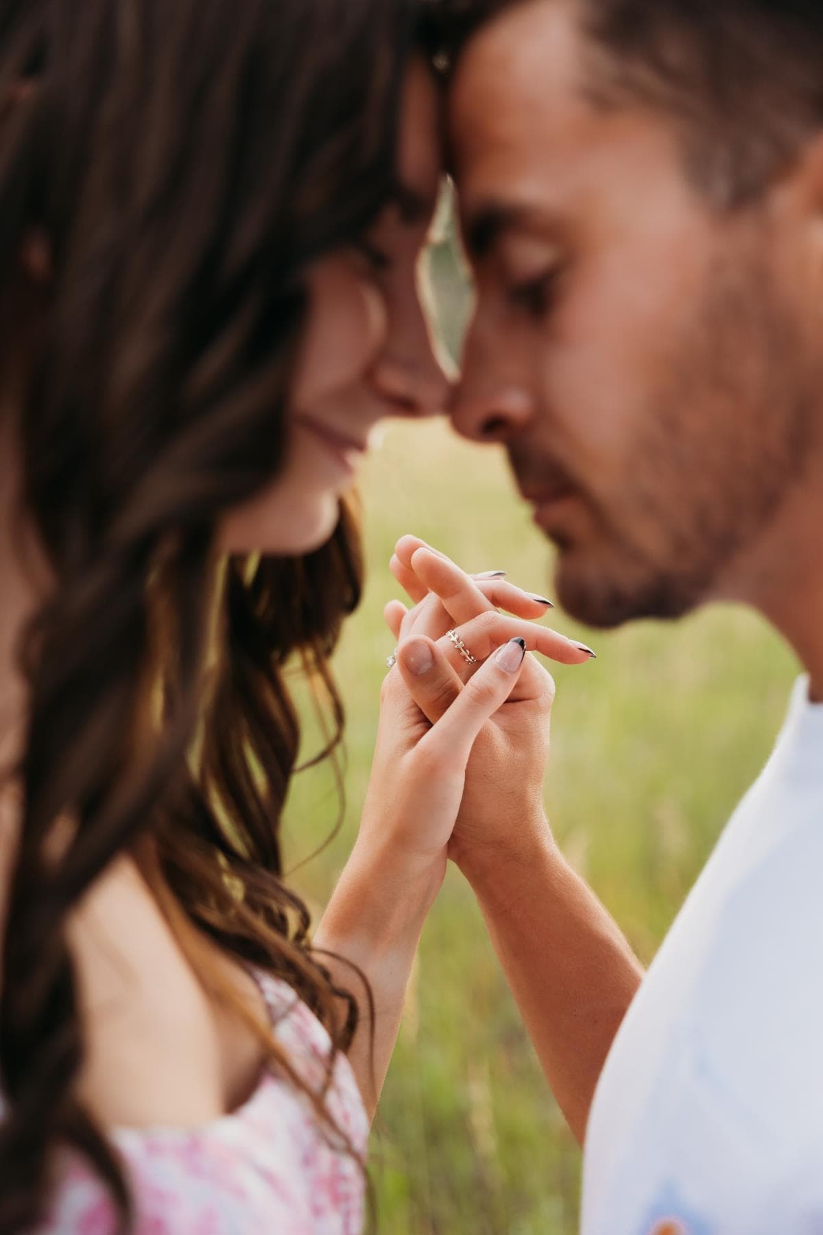 Engaged couple holding hands outdoor portrait Fort Collins Colorado