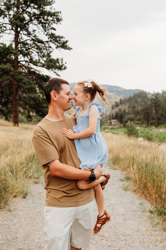Kids running in field family session Severance Colorado