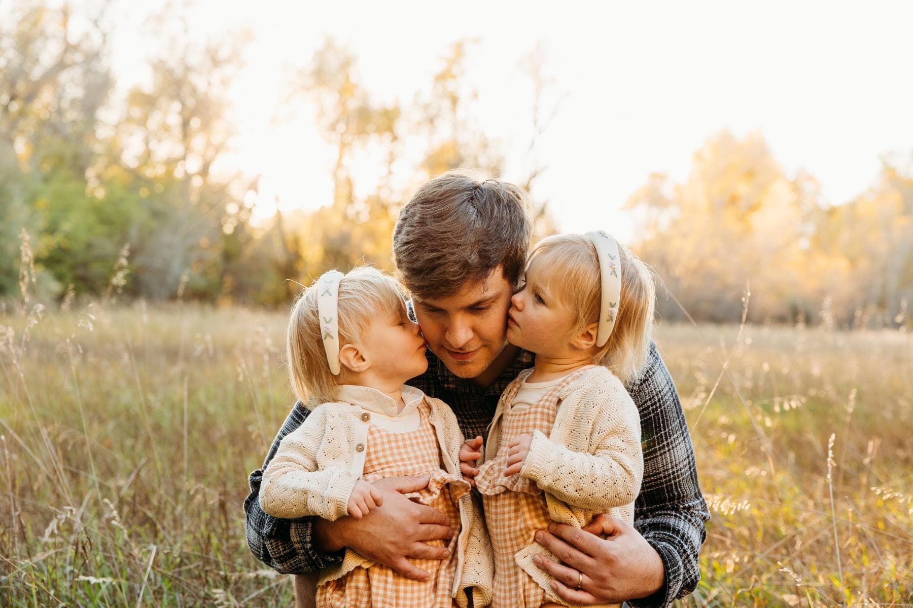 Kids running in field family session Severance Colorado