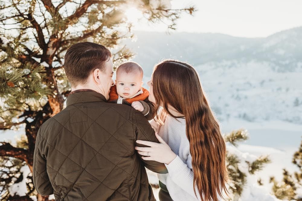 Kids running in field family session Severance Colorado