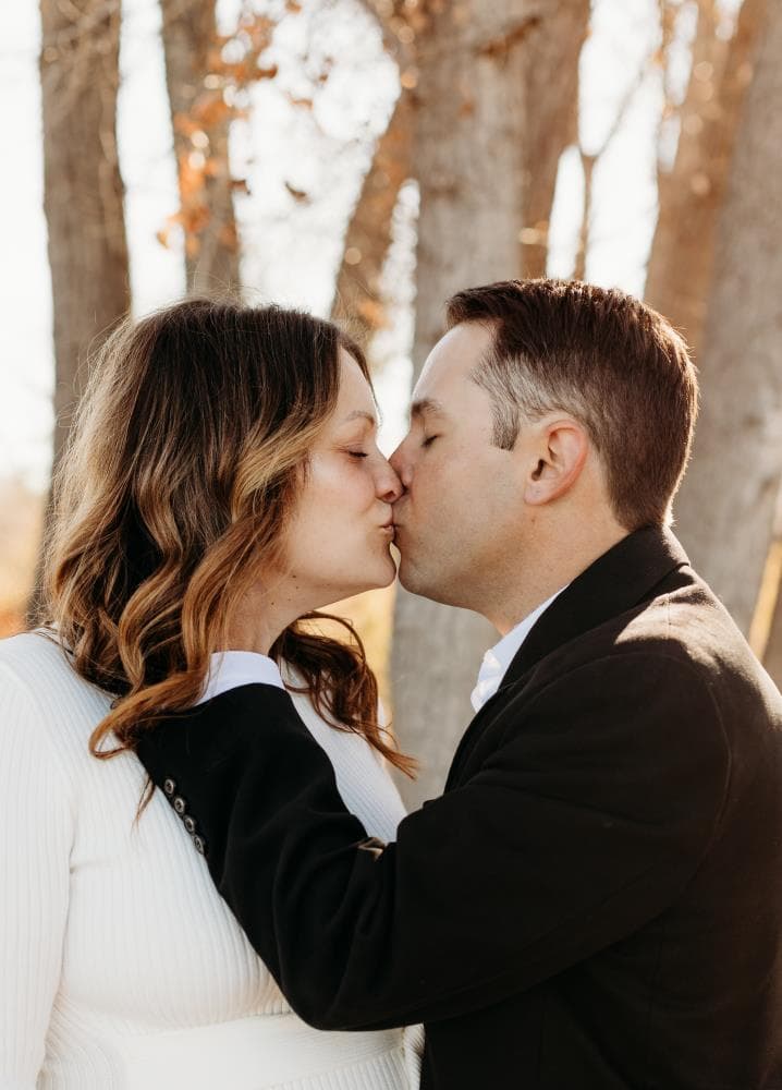 Pregnant mother cradling bump outdoor maternity session Northern Colorado