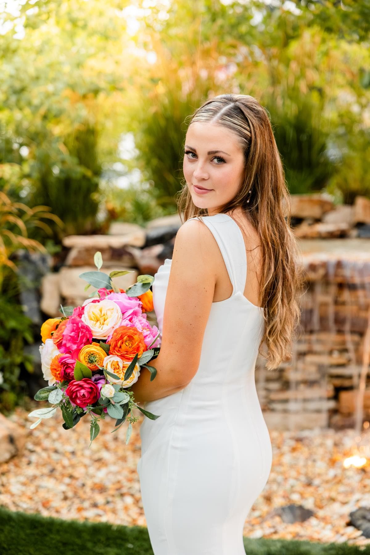 Bride walking down aisle surrounded by guests Northern Colorado wedding
