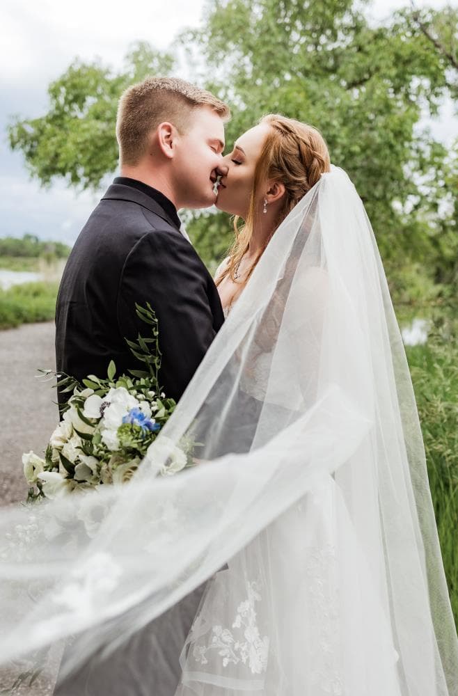 Bride walking down aisle surrounded by guests Northern Colorado wedding