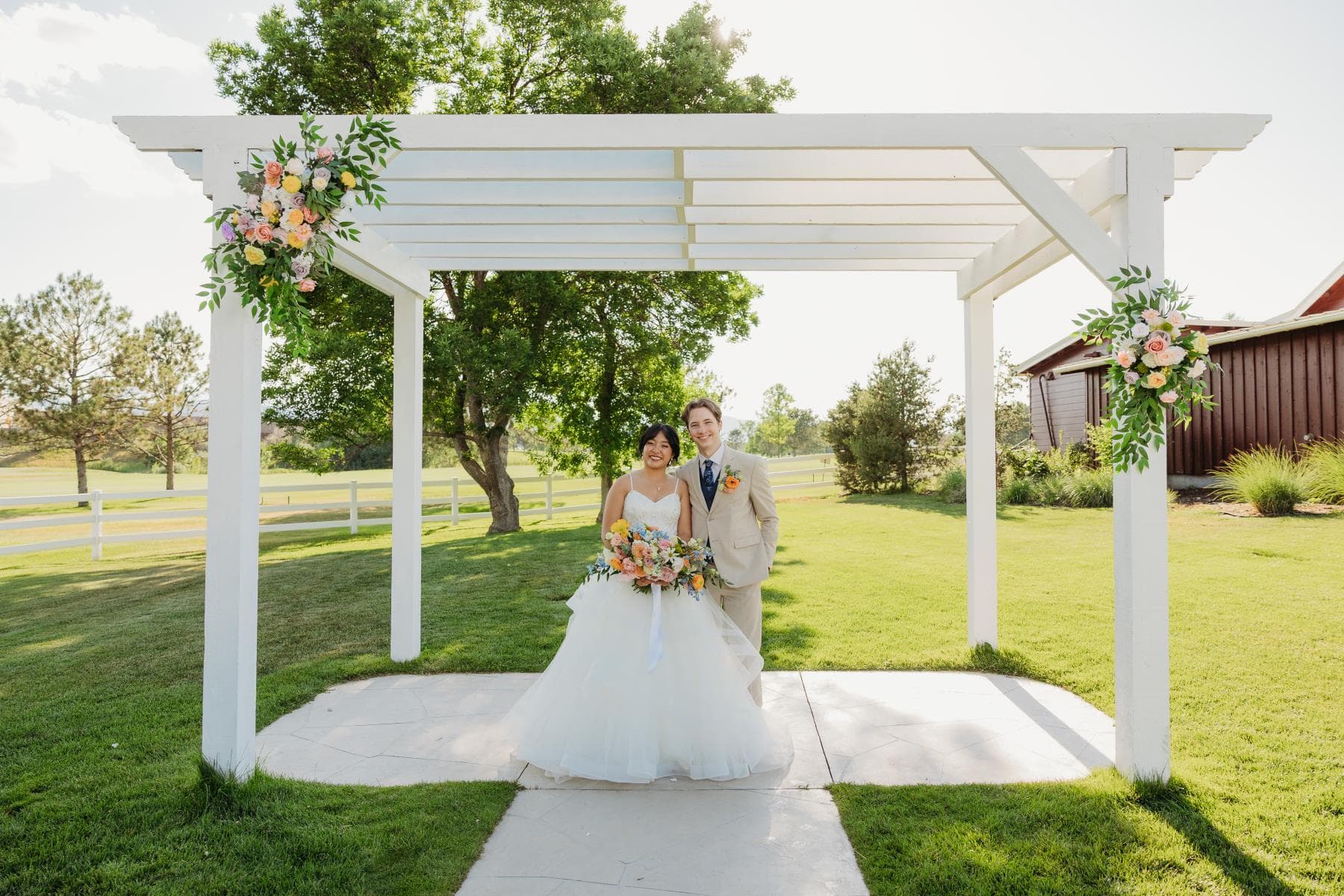 Bride walking down aisle surrounded by guests Northern Colorado wedding