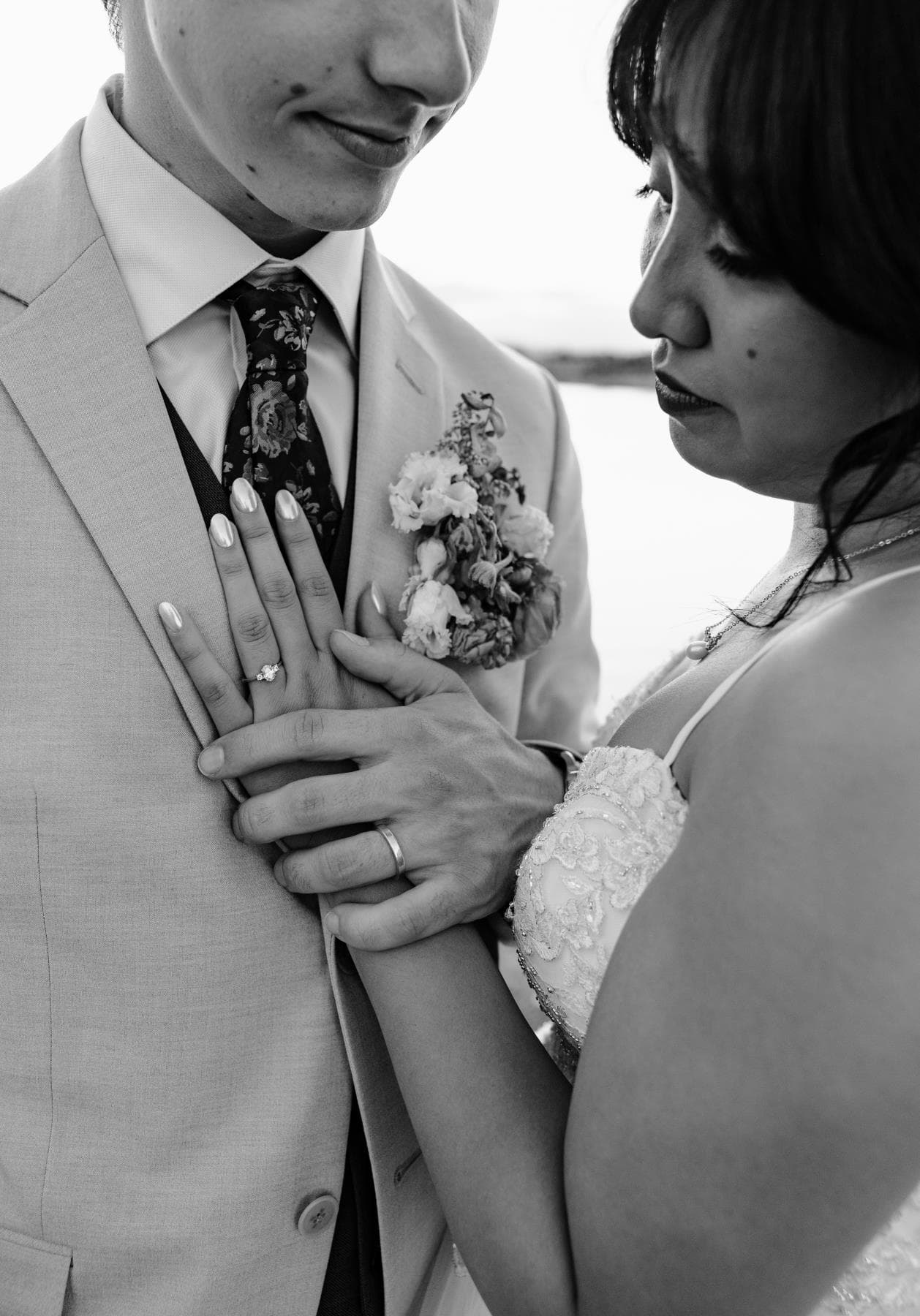 Bride and groom sharing first kiss at outdoor wedding ceremony Colorado